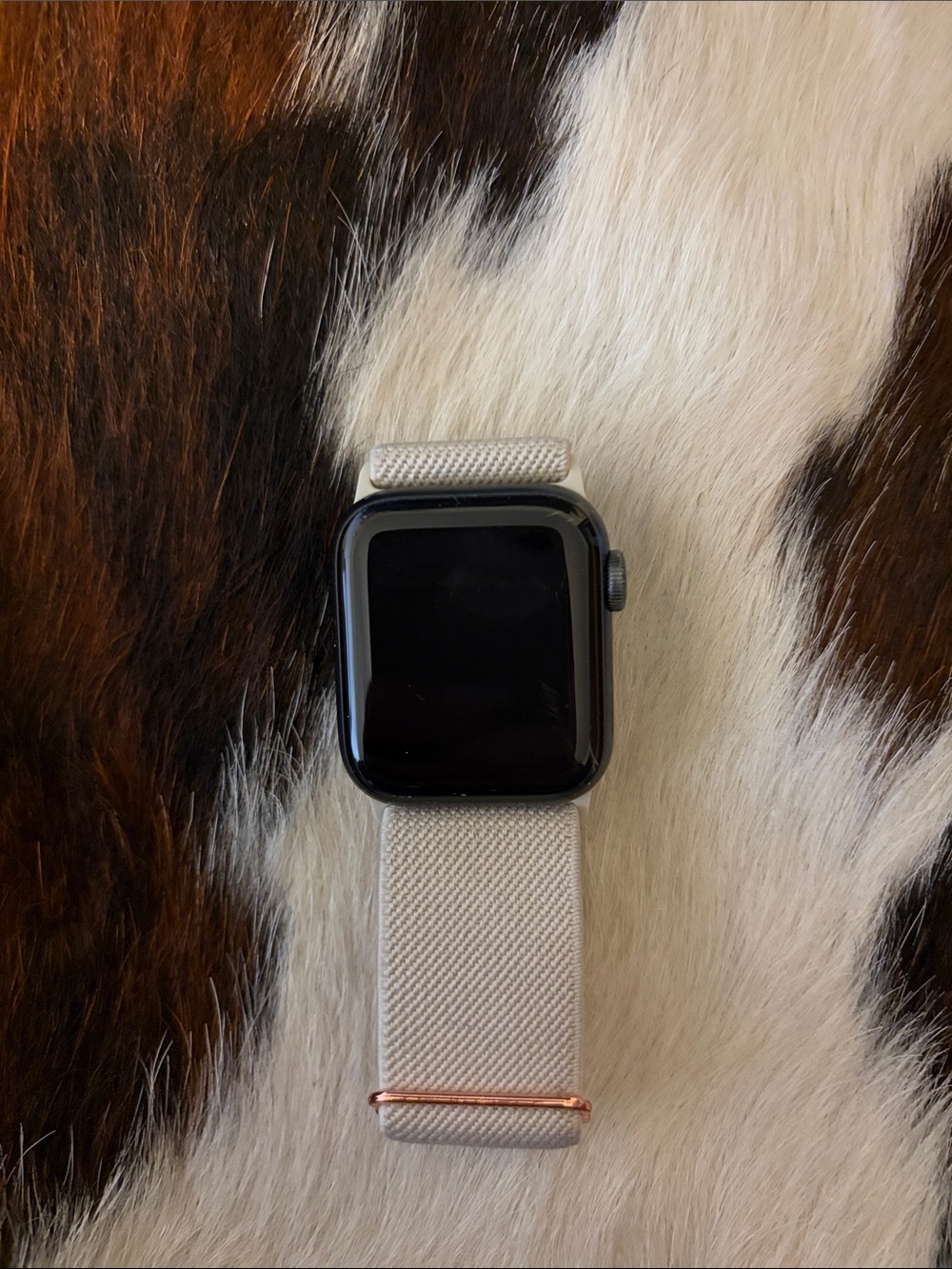 Apple Watch Series 5 with Black Case and Cream Woven Band